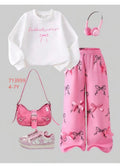 Girls white I'm literally just a girl slogan sweatshirt and pink bow print wide-leg pants set, ages 4-7