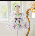 Girls white floral organza dress with puff sleeves, purple ribbon bow and matching headband, ages 1-4