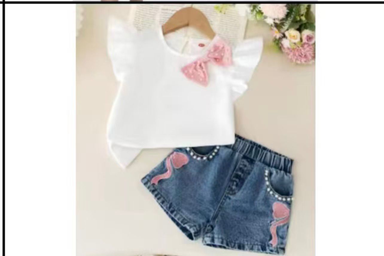 Girl jeans shorts with a blouse